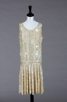 Lot 438 - An opalescent sequined cocktail/flapper dress,...