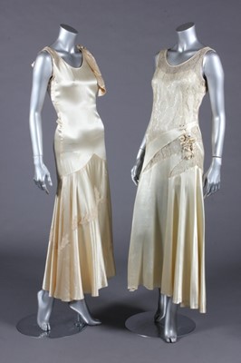 Lot 440 - Two 1930s satin bridal/presentation gowns, one...