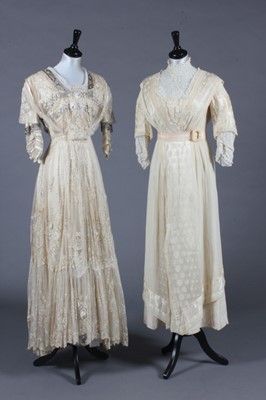 Lot 441 - A tamboured net and chemical lace bridal gown,...