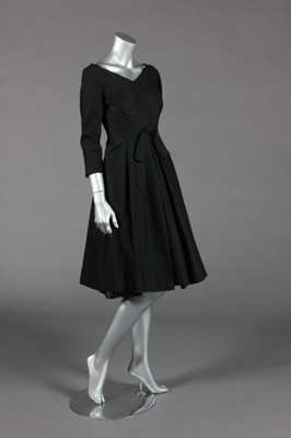 Lot 448 - Little black dresses, 1950s-early 60s,...