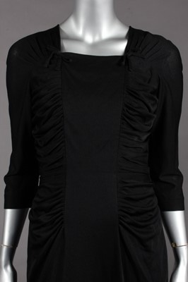 Lot 448 - Little black dresses, 1950s-early 60s,...