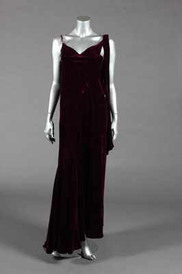 Lot 450 - An altered Chanel couture aubergine evening...