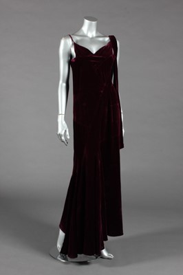 Lot 450 - An altered Chanel couture aubergine evening...