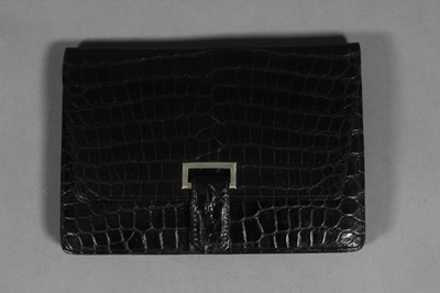 Lot 458 - An Hermès black crocodile clutch bag, 1940s,...