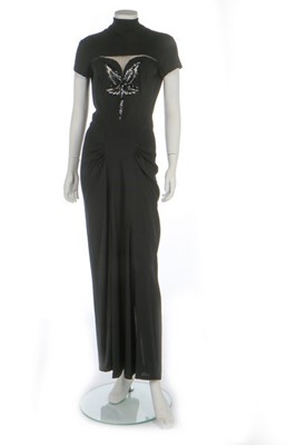 Lot 131 - A Jean Patou couture black crêpe dinner dress,...