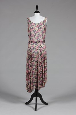 Lot 74 - A printed chiffon and beaded gown and jacket,...