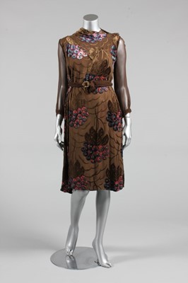 Lot 99 - Two late 1920s dinner gowns, the first of...