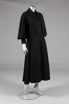 Lot 84 - An Yves Saint Laurent black wool redingote,...