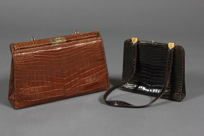 Lot 414 - Two crocodile handbags, circa 1960, crocodylus...