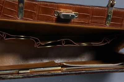 Lot 414 - Two crocodile handbags, circa 1960, crocodylus...