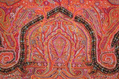 Lot 49 - A woven kashmir shawl, circa 1860, small black...