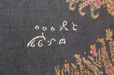 Lot 49 - A woven kashmir shawl, circa 1860, small black...