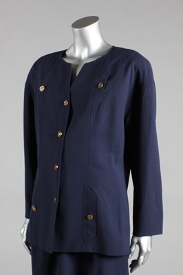 Lot 94 - A Chanel navy crepe suit, late 80s-early 90s,...