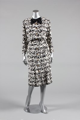 Lot 95 - A Chanel black and white printed silk crepe...