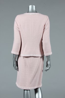 Lot 17 - A Chanel pink wool suit, circa 2010, boutique...