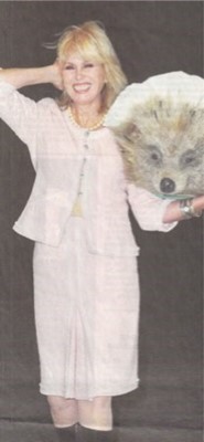 Lot 17 - A Chanel pink wool suit, circa 2010, boutique...