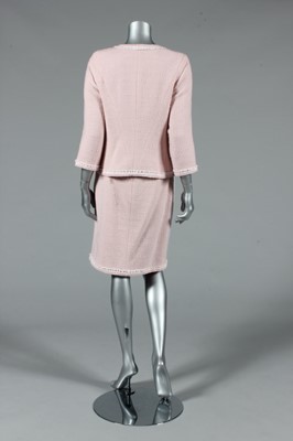 Lot 17 - A Chanel pink wool suit, circa 2010, boutique...