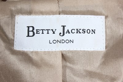 Lot 37 - A Betty Jackson gold velvet 'cagoule', worn in...