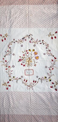 Lot 55A - An embroidered and patchworked coverlet, by...