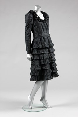 Lot 198 - An Yves Saint Laurent couture black taffeta...