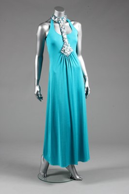 Lot 195 - A Loris Azzaro deep turquoise jersey dress and...