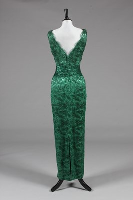 Lot 204 - A Loris Azzaro green metallic lace evening...