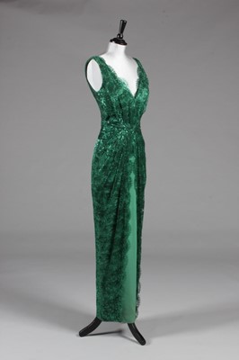 Lot 204 - A Loris Azzaro green metallic lace evening...