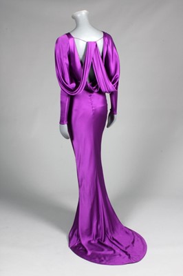 Lot 281 - An Alexander McQueen purple satin evening gown,...