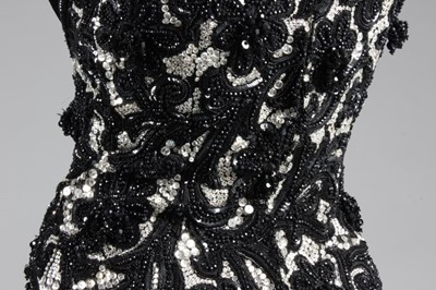 Lot 272 - A Valentino couture black velvet cocktail...