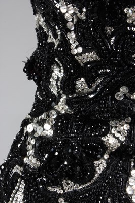 Lot 272 - A Valentino couture black velvet cocktail...