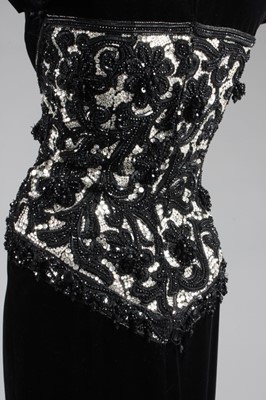 Lot 272 - A Valentino couture black velvet cocktail...