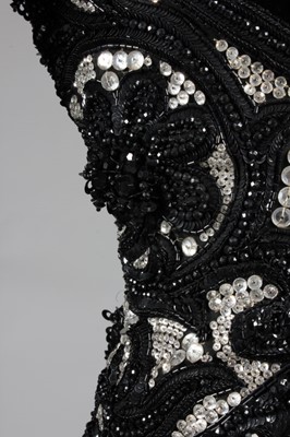 Lot 272 - A Valentino couture black velvet cocktail...