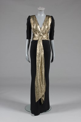 Lot 255 - An Yves Saint Laurent gold lamé and black...