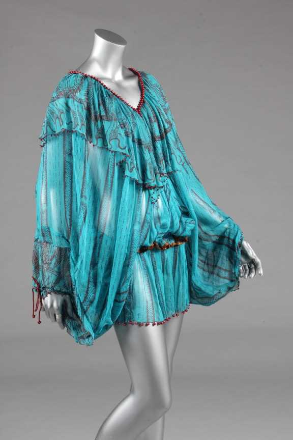 Lot 260 - A Zandra Rhodes turquoise chiffon cocktail...