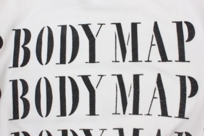 Lot 217 - A Body Map white stretch velvet and black...