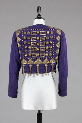 Lot 262 - A Gianni Versace purple suede bolero jacket,...