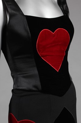 Lot 267 - A Moschino 'Cheap and Chic' playing-card suit,...