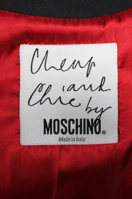 Lot 267 - A Moschino 'Cheap and Chic' playing-card suit,...