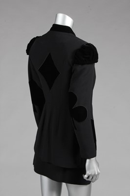 Lot 267 - A Moschino 'Cheap and Chic' playing-card suit,...