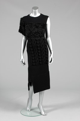 Lot 236 - A Yohji Yamamoto black knitted-patchwork dress,...