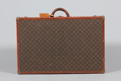 Lot 28 - A Louis Vuitton hard-sided suitcase, probably...