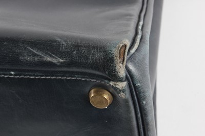 Lot 16 - An Hermès navy leather Kelly bag, 1960s,...
