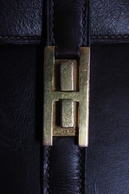Lot 31 - An Hermès brown leather Drag bag, 1960s,...