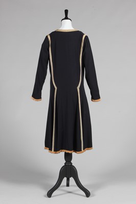 Lot 69 - A rare Paul Poiret navy wool day dress...