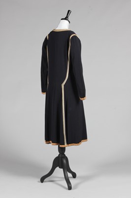 Lot 69 - A rare Paul Poiret navy wool day dress...