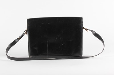 Lot 6 - An Hermès black leather handbag, late 1960s,...