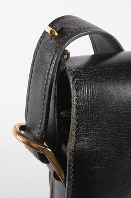 Lot 6 - An Hermès black leather handbag, late 1960s,...