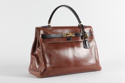 Lot 15 - An Hermès brown box leather Kelly bag with...