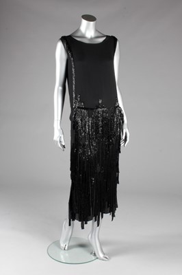Lot 78 - A rare 'ribbon' dress, 1926, attributed to...