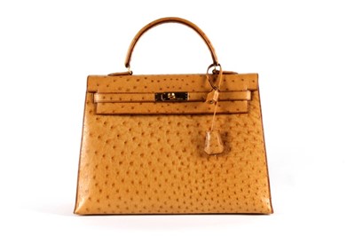 Lot 12 - An Hermès golden-brown ostrich Kelly bag, 1994,...